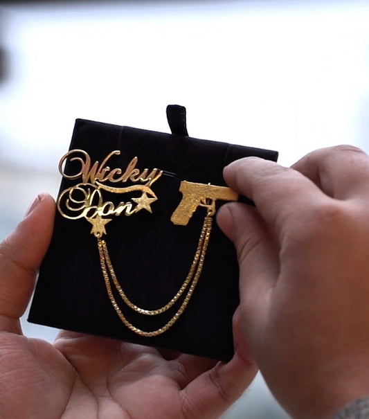 Gun Coat Pin